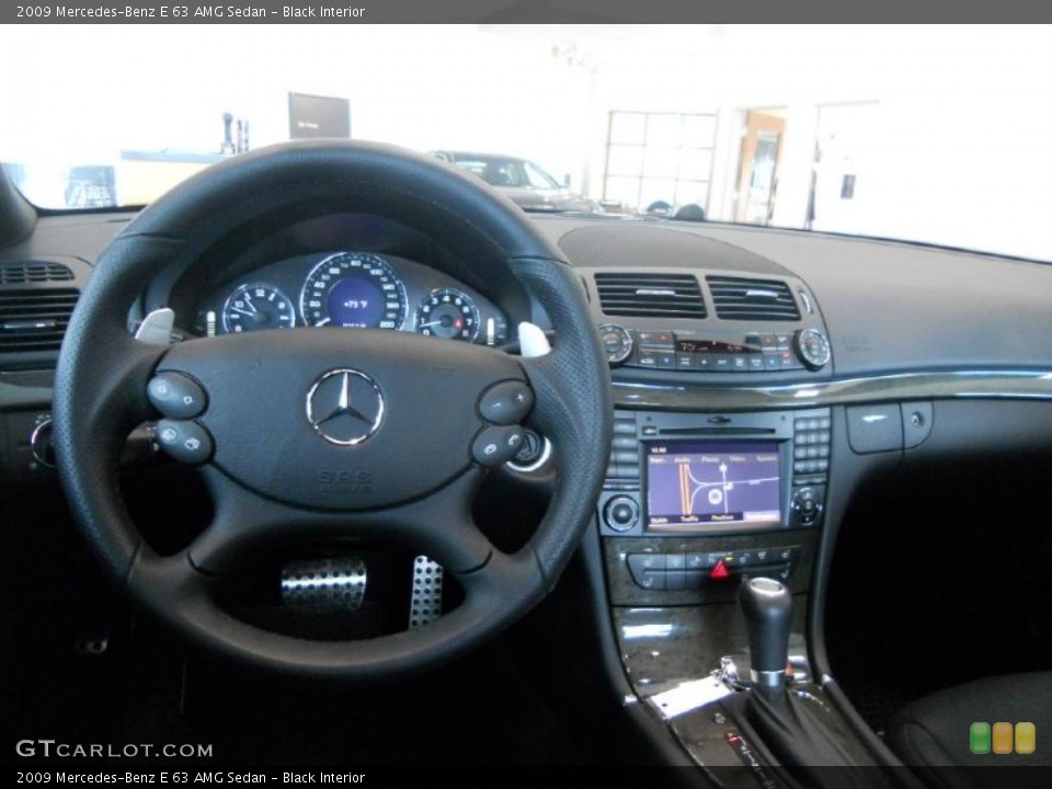 Black Interior Dashboard for the 2009 Mercedes-Benz E 63 AMG Sedan #49376468
