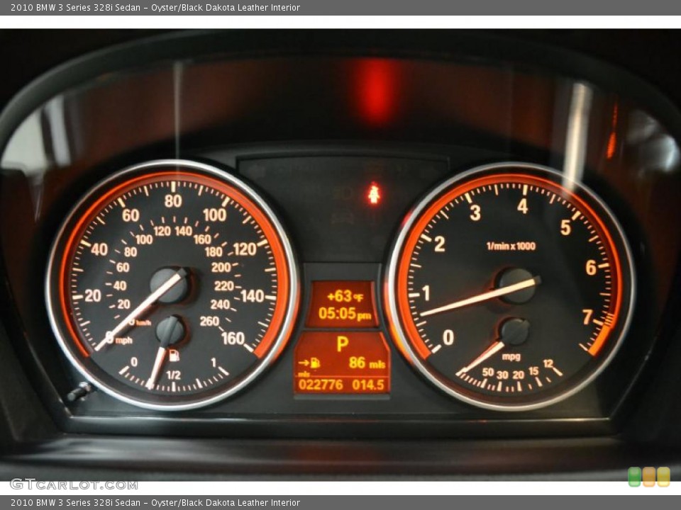 Oyster/Black Dakota Leather Interior Gauges for the 2010 BMW 3 Series 328i Sedan #49396907