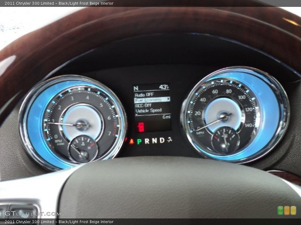 Black/Light Frost Beige Interior Gauges for the 2011 Chrysler 300 Limited #49416562