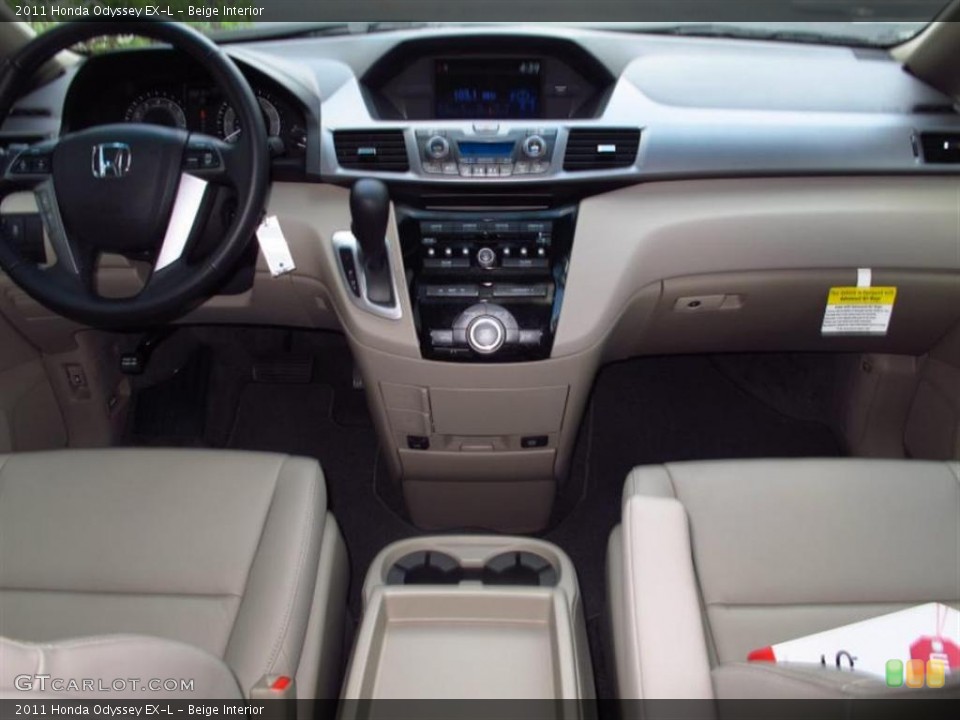 Beige Interior Dashboard for the 2011 Honda Odyssey EX-L #49455079