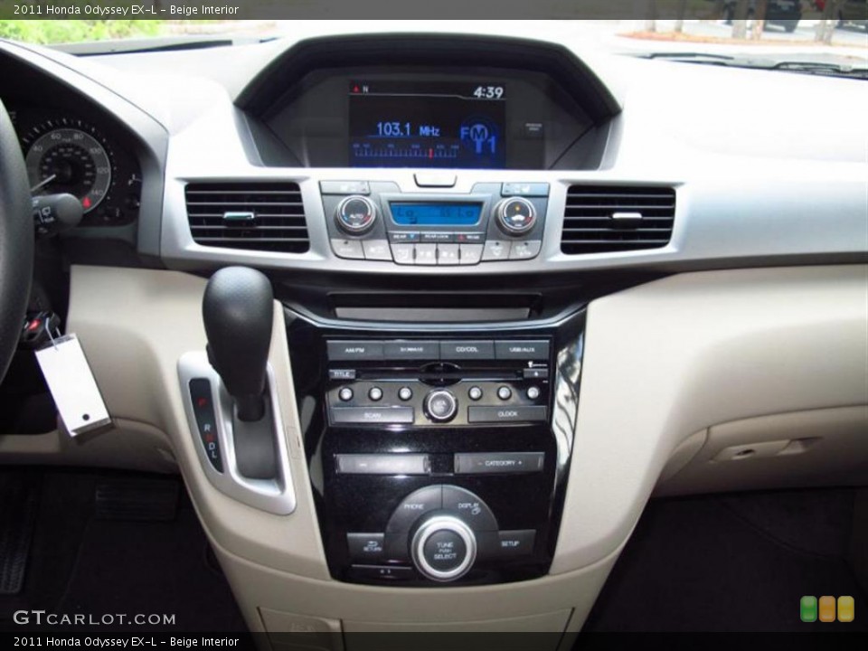 Beige Interior Controls for the 2011 Honda Odyssey EX-L #49455112