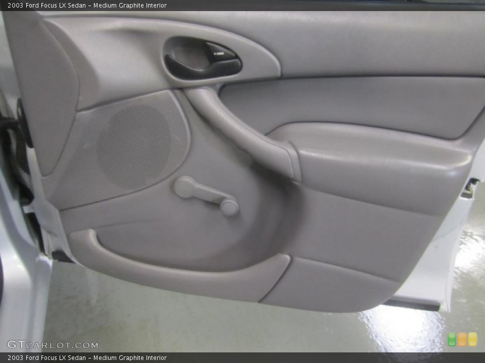 Medium Graphite Interior Door Panel for the 2003 Ford Focus LX Sedan #49497354