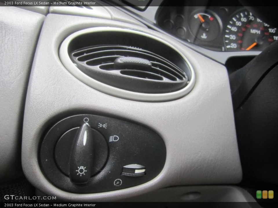 Medium Graphite Interior Controls for the 2003 Ford Focus LX Sedan #49497399