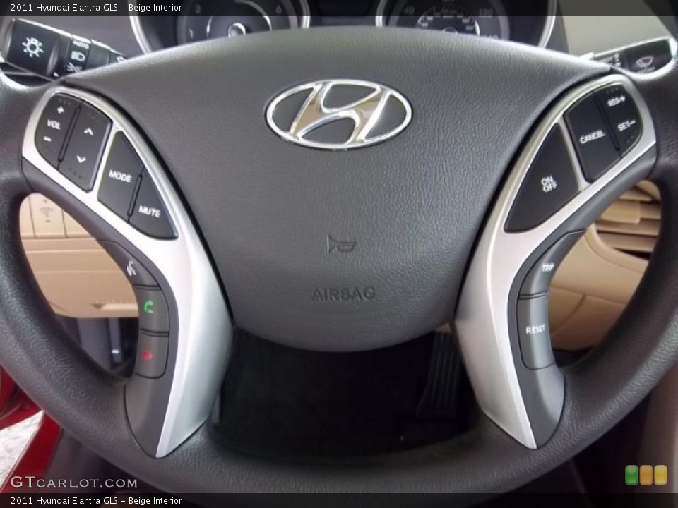 Beige Interior Steering Wheel for the 2011 Hyundai Elantra GLS #49517273