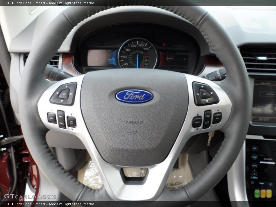 Medium Light Stone Interior Steering Wheel for the 2011 Ford Edge Limited #49577587