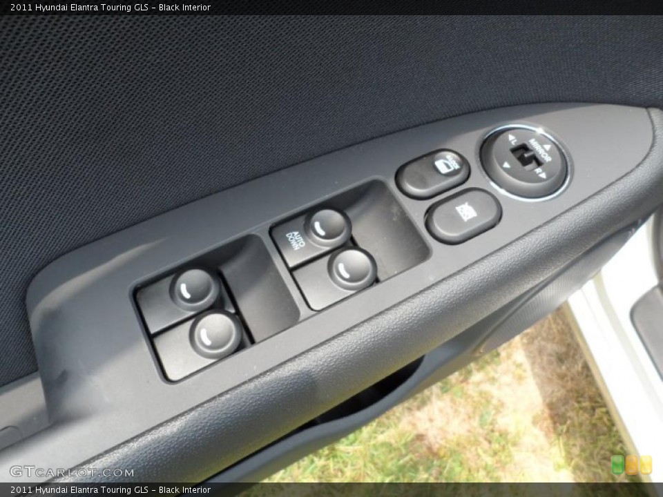 Black Interior Controls for the 2011 Hyundai Elantra Touring GLS #49585531