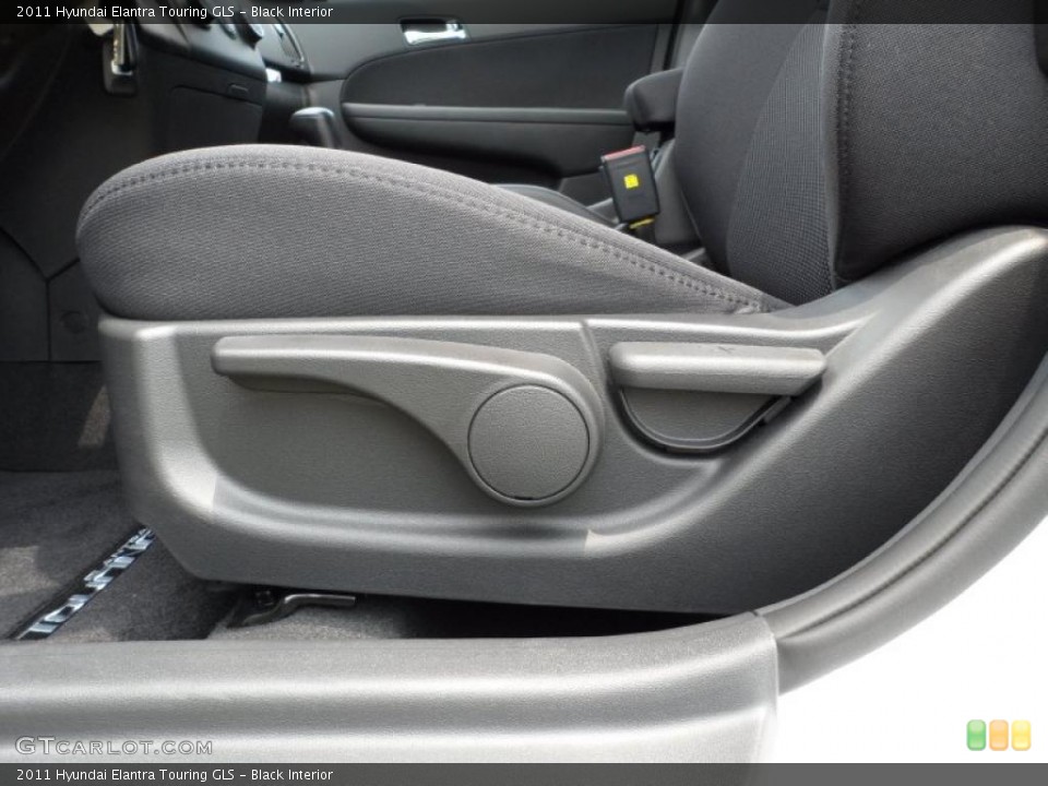 Black Interior Controls for the 2011 Hyundai Elantra Touring GLS #49585567