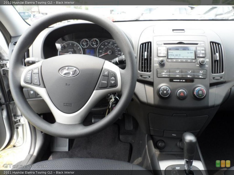 Black Interior Controls for the 2011 Hyundai Elantra Touring GLS #49585585