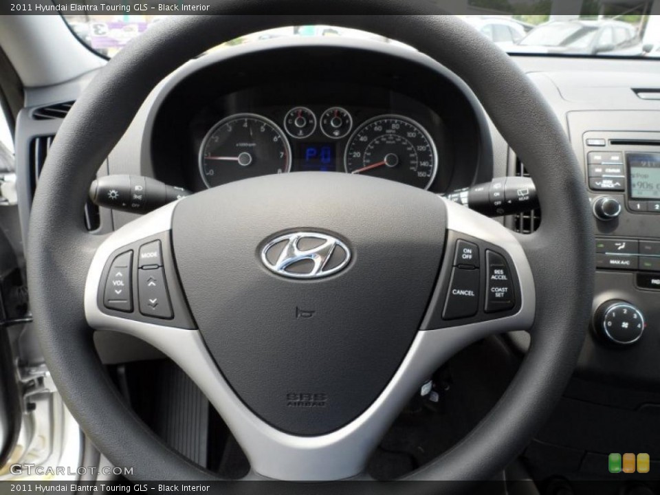 Black Interior Steering Wheel for the 2011 Hyundai Elantra Touring GLS #49585659