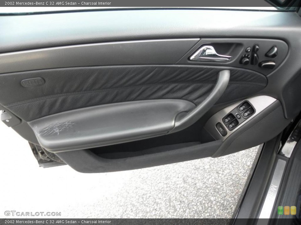 Charcoal Interior Door Panel for the 2002 Mercedes-Benz C 32 AMG Sedan #49610812