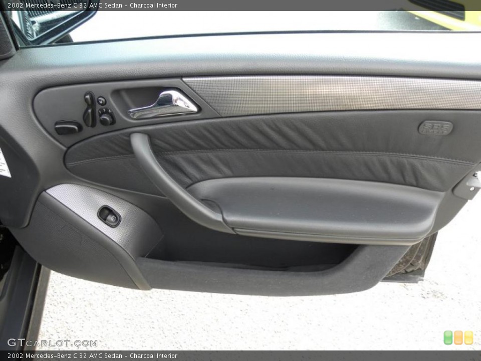 Charcoal Interior Door Panel for the 2002 Mercedes-Benz C 32 AMG Sedan #49610881