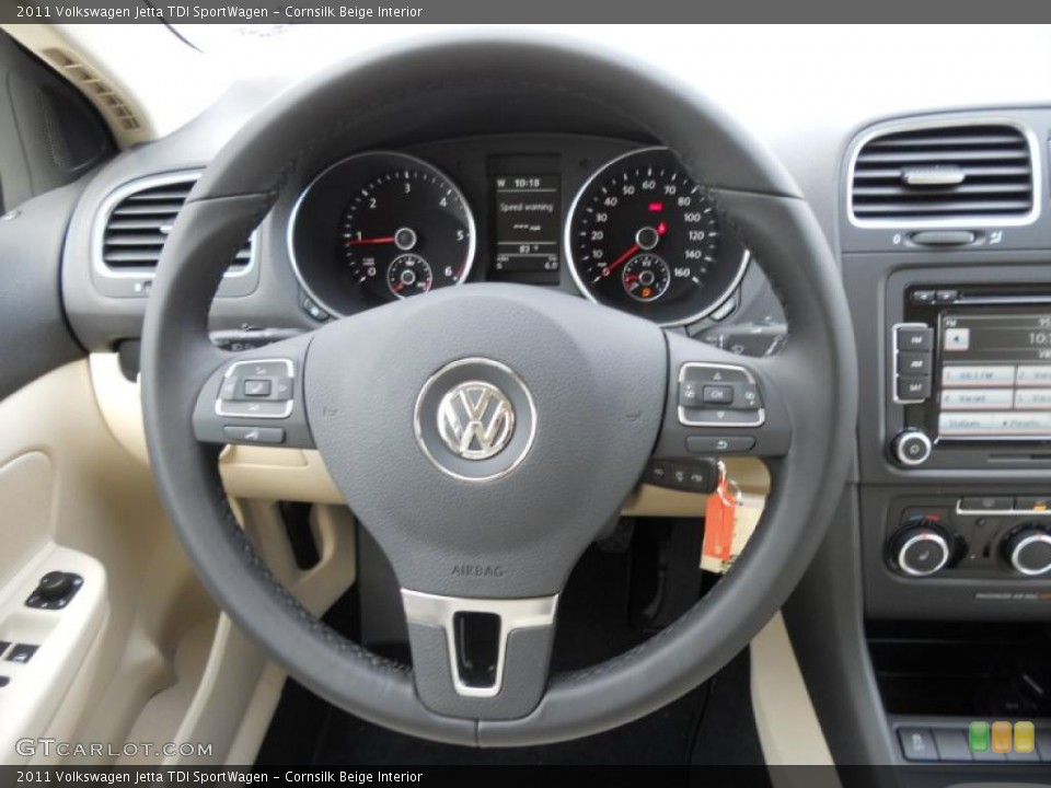 Cornsilk Beige Interior Steering Wheel for the 2011 Volkswagen Jetta TDI SportWagen #49612747