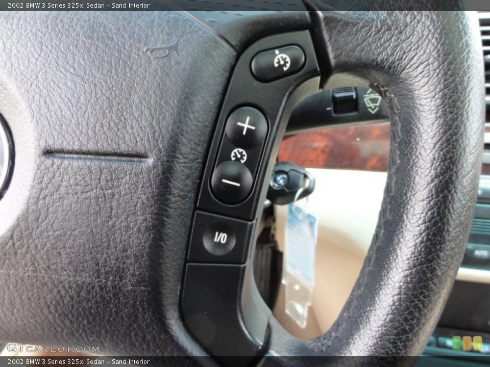 Sand Interior Controls for the 2002 BMW 3 Series 325xi Sedan #49619233