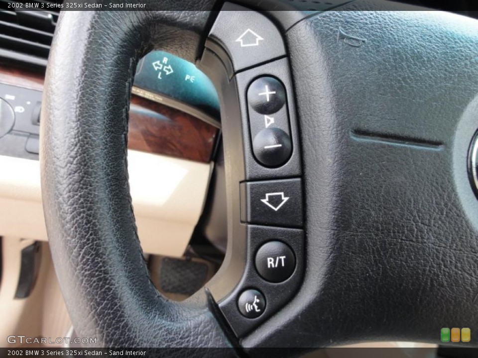 Sand Interior Controls for the 2002 BMW 3 Series 325xi Sedan #49619248