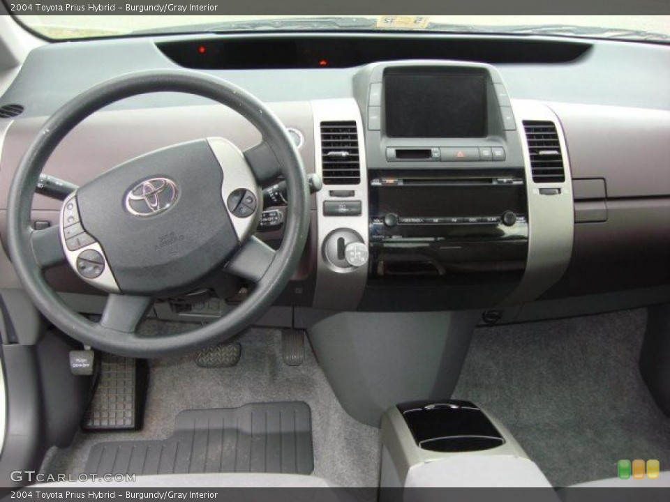 Burgundy/Gray Interior Dashboard for the 2004 Toyota Prius Hybrid #49635368