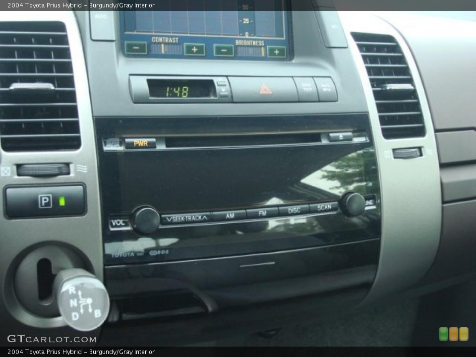 Burgundy/Gray Interior Controls for the 2004 Toyota Prius Hybrid #49635407