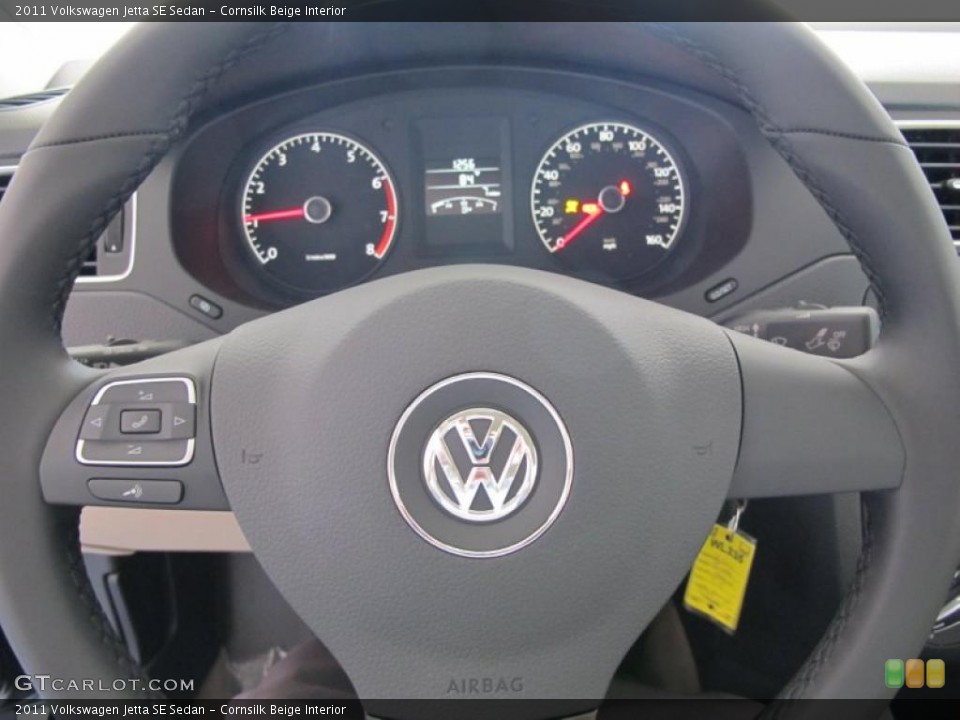 Cornsilk Beige Interior Steering Wheel for the 2011 Volkswagen Jetta SE Sedan #49663234