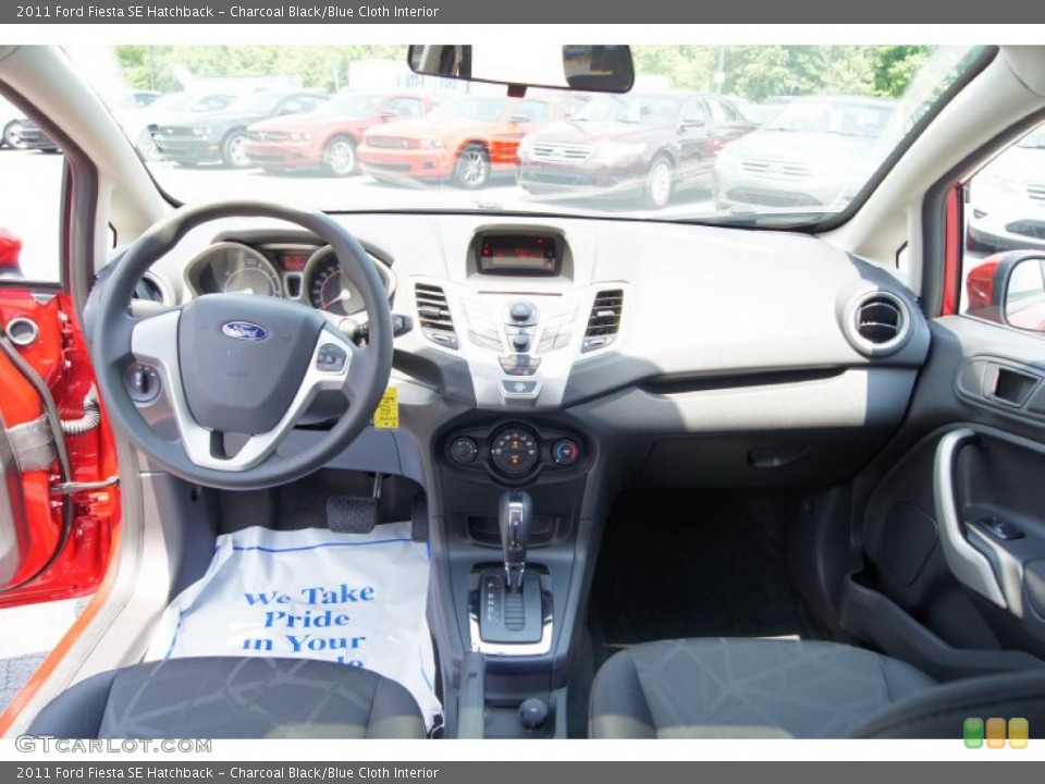 Charcoal Black/Blue Cloth Interior Dashboard for the 2011 Ford Fiesta SE Hatchback #49716217