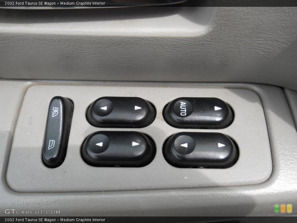 Medium Graphite Interior Controls for the 2002 Ford Taurus SE Wagon #49723519