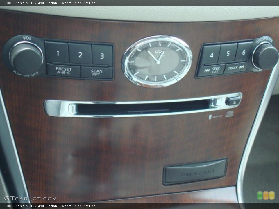 Wheat Beige Interior Controls for the 2009 Infiniti M 35x AWD Sedan #49725187