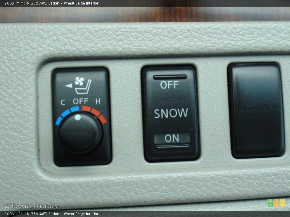 Wheat Beige Interior Controls for the 2009 Infiniti M 35x AWD Sedan #49725217