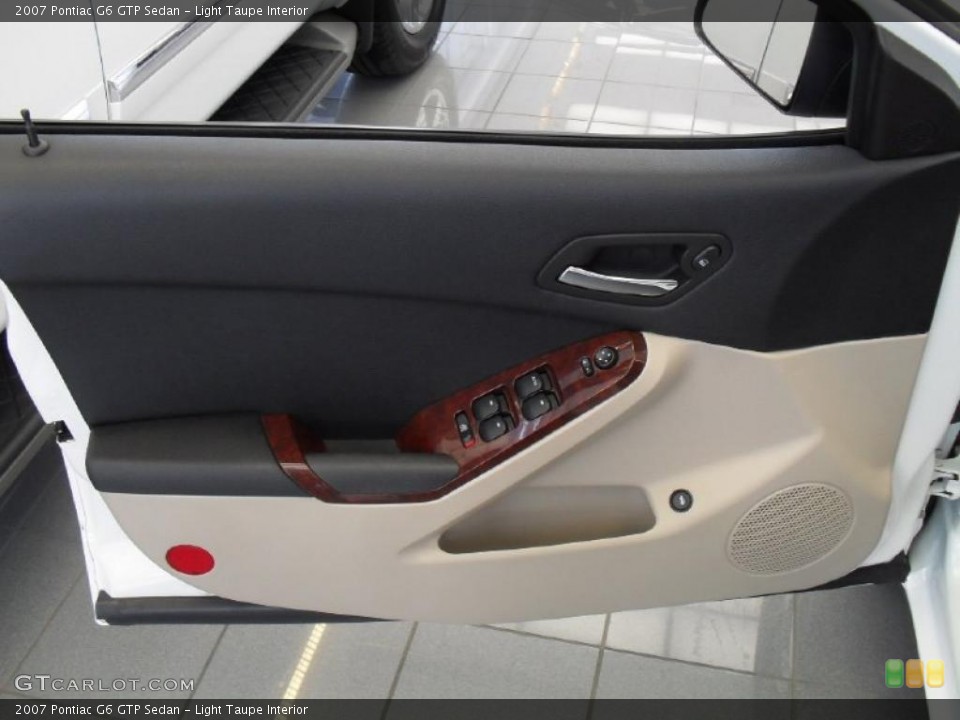 Light Taupe Interior Door Panel for the 2007 Pontiac G6 GTP Sedan #49739116