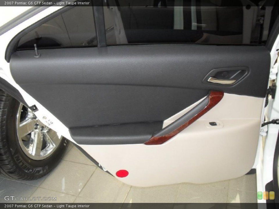 Light Taupe Interior Door Panel for the 2007 Pontiac G6 GTP Sedan #49739128