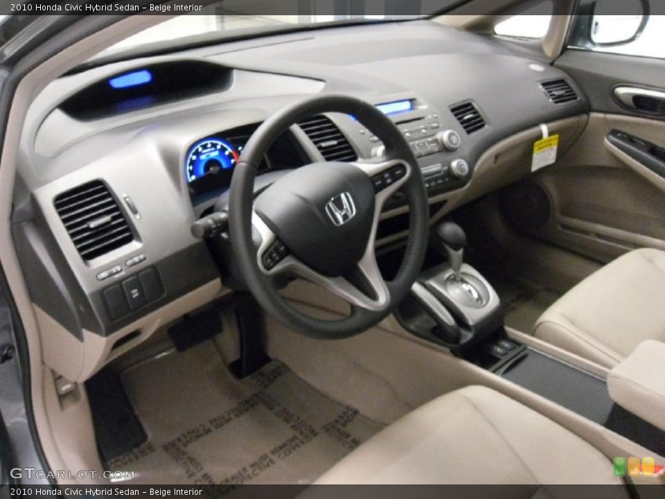 Beige Interior Prime Interior for the 2010 Honda Civic Hybrid Sedan #49743157