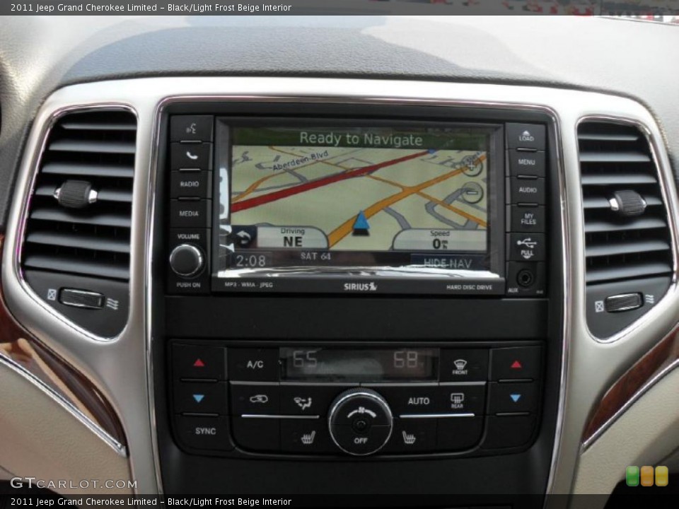 Black/Light Frost Beige Interior Navigation for the 2011 Jeep Grand Cherokee Limited #49744273