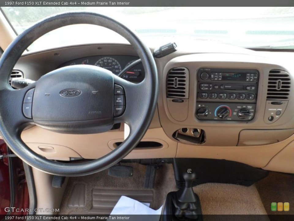 Medium Prairie Tan Interior Dashboard for the 1997 Ford F150 XLT Extended Cab 4x4 #49747303