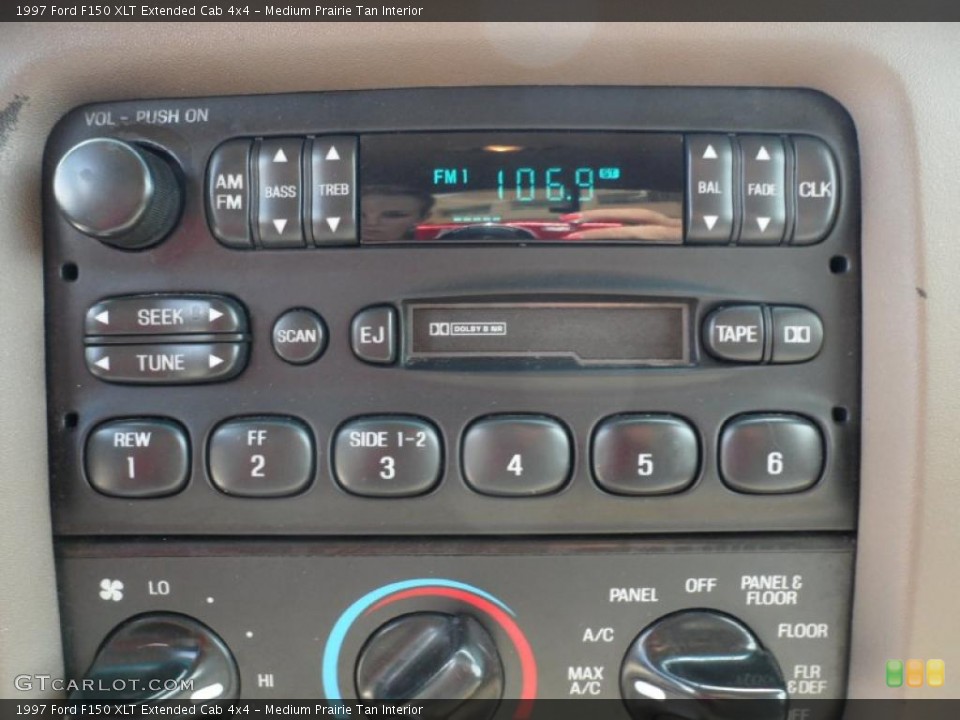 Medium Prairie Tan Interior Controls for the 1997 Ford F150 XLT Extended Cab 4x4 #49747309