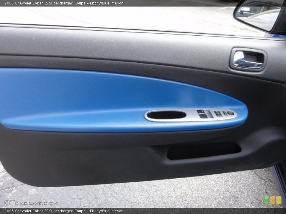 Ebony/Blue Interior Door Panel for the 2005 Chevrolet Cobalt SS Supercharged Coupe #49760245