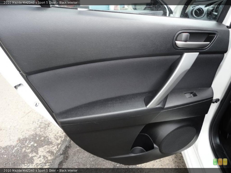 Black Interior Door Panel for the 2010 Mazda MAZDA3 s Sport 5 Door #49762186