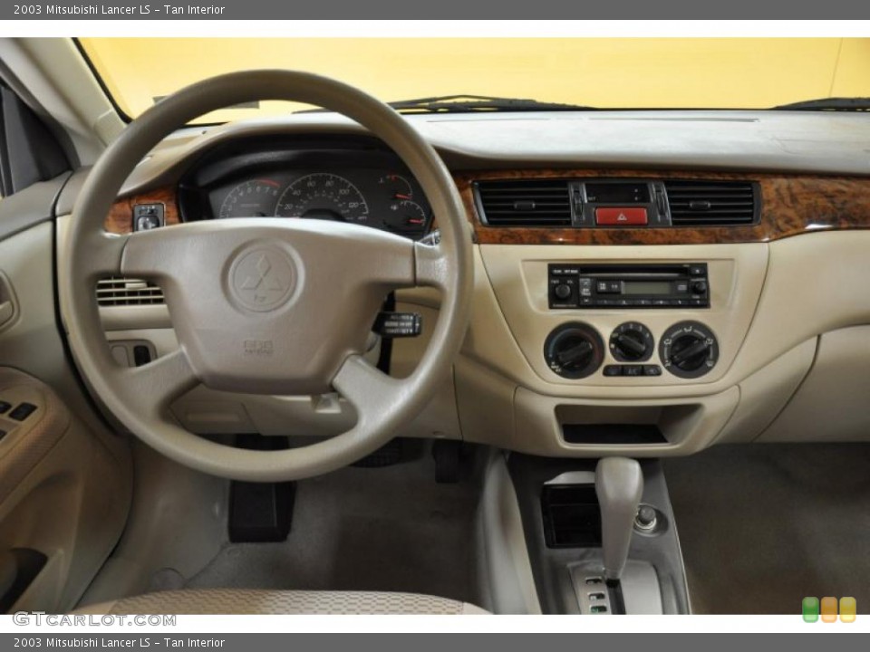 Tan Interior Dashboard for the 2003 Mitsubishi Lancer LS #49765159