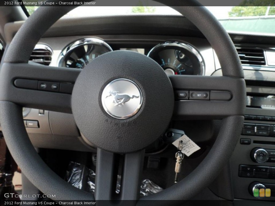 Charcoal Black Interior Steering Wheel for the 2012 Ford Mustang V6 Coupe #49769858
