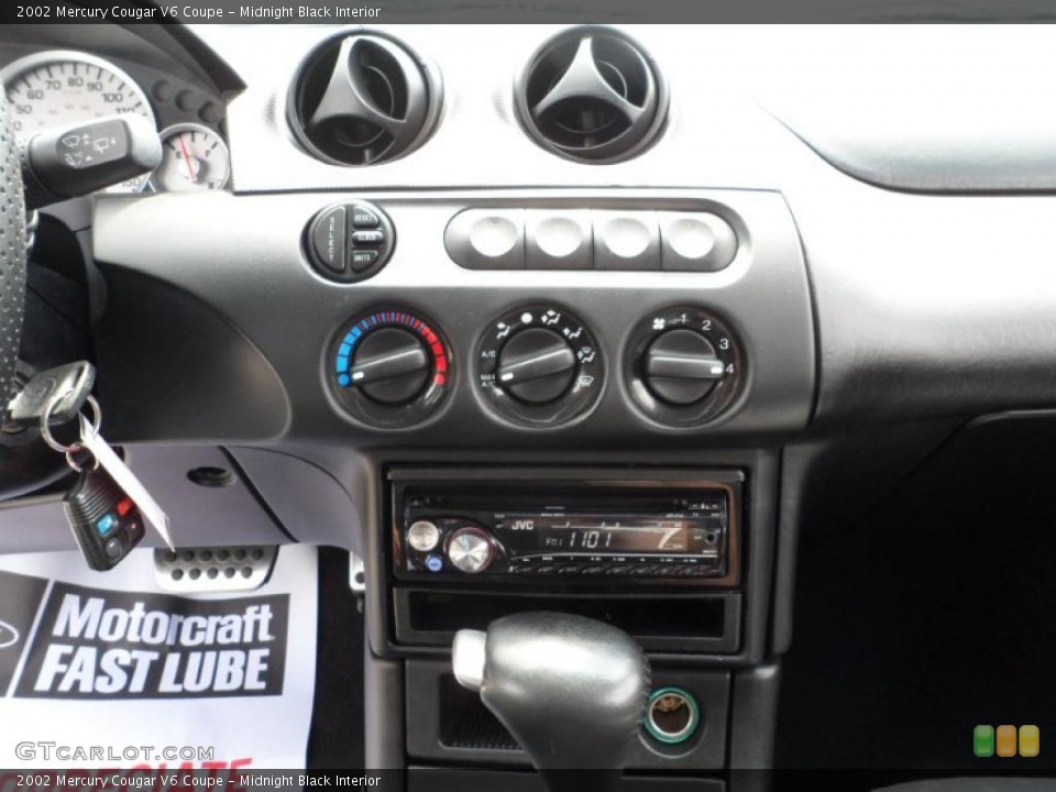 Midnight Black Interior Controls for the 2002 Mercury Cougar V6 Coupe #49770670