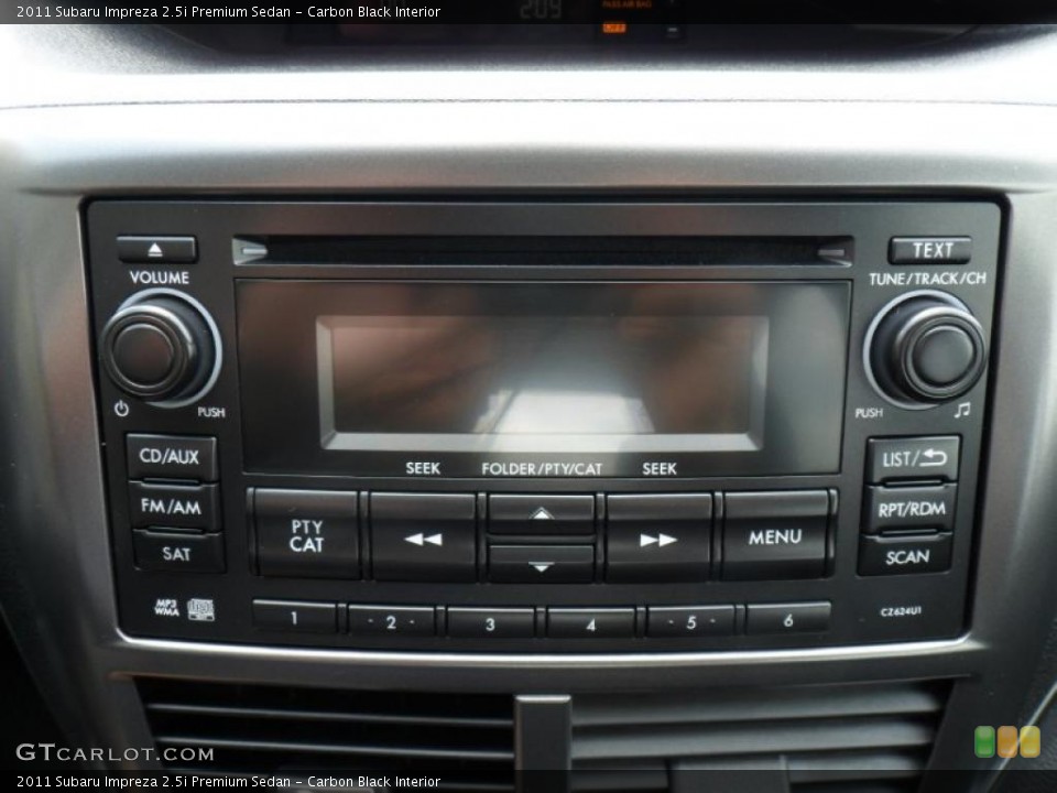 Carbon Black Interior Controls for the 2011 Subaru Impreza 2.5i Premium Sedan #49790588