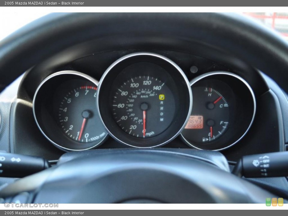 Black Interior Gauges for the 2005 Mazda MAZDA3 i Sedan #49823937