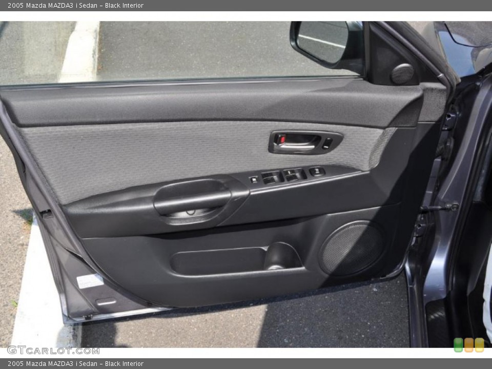 Black Interior Door Panel for the 2005 Mazda MAZDA3 i Sedan #49824087