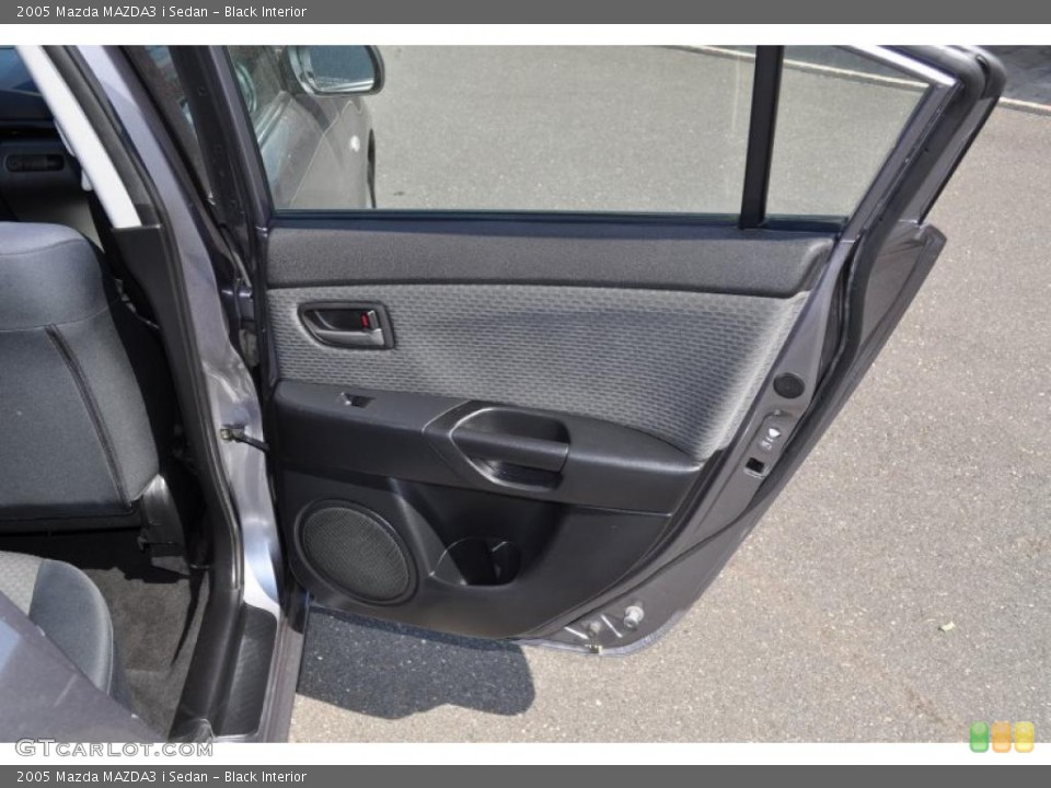 Black Interior Door Panel for the 2005 Mazda MAZDA3 i Sedan #49824117