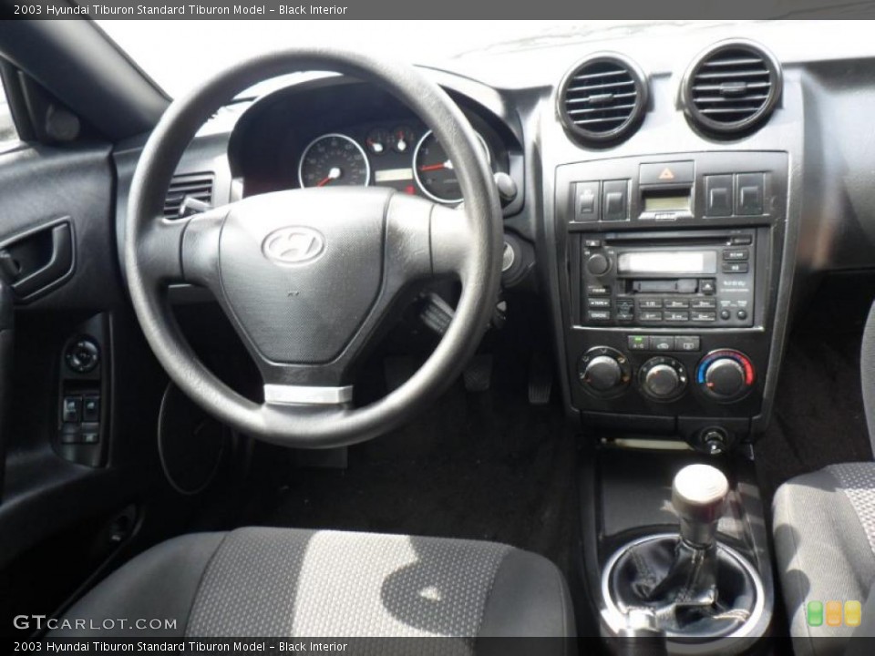 Black Interior Dashboard for the 2003 Hyundai Tiburon  #49827300