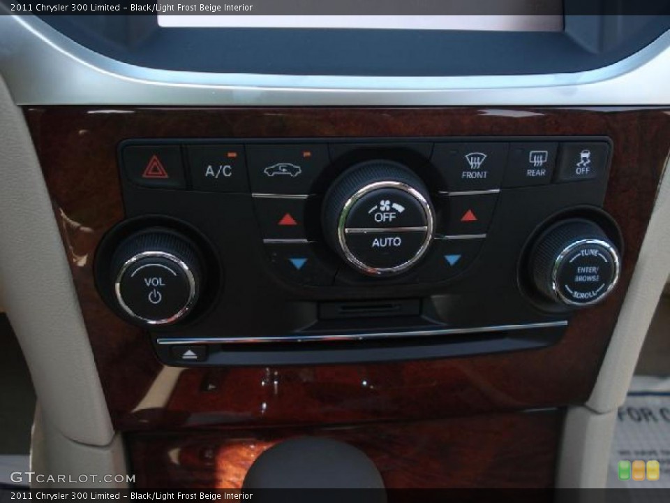 Black/Light Frost Beige Interior Controls for the 2011 Chrysler 300 Limited #49840537