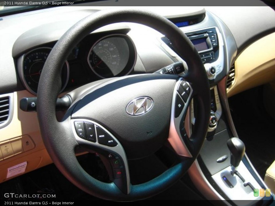 Beige Interior Steering Wheel for the 2011 Hyundai Elantra GLS #49847785