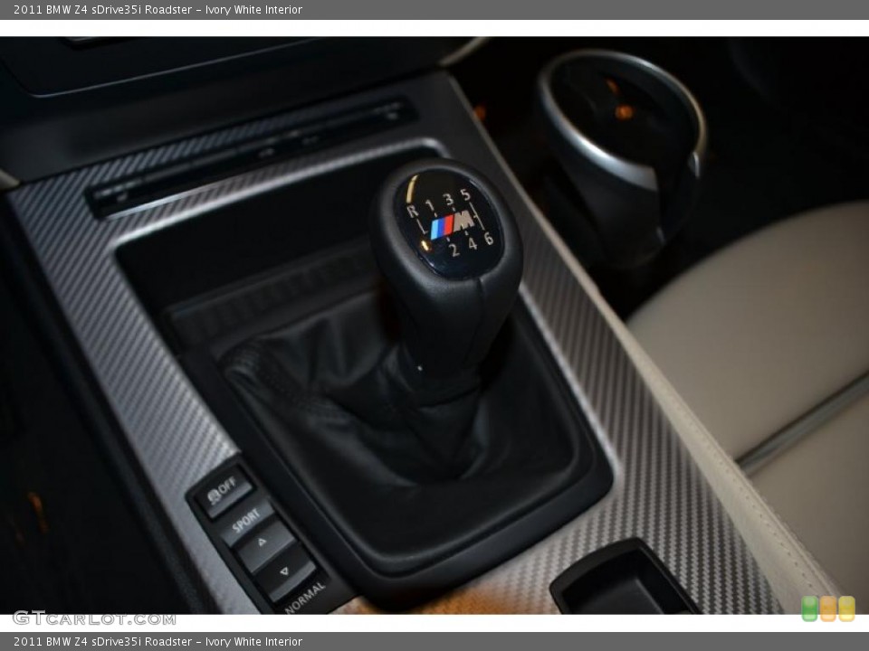 Ivory White Interior Transmission for the 2011 BMW Z4 sDrive35i Roadster #49852375