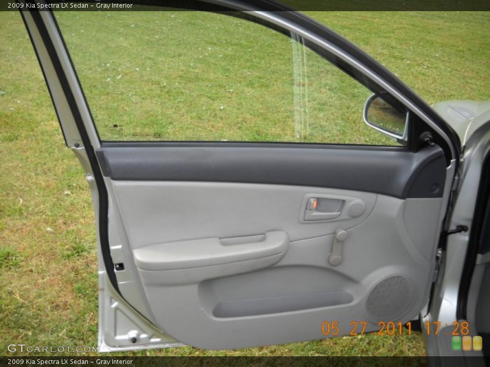 Gray Interior Door Panel for the 2009 Kia Spectra LX Sedan #49864196