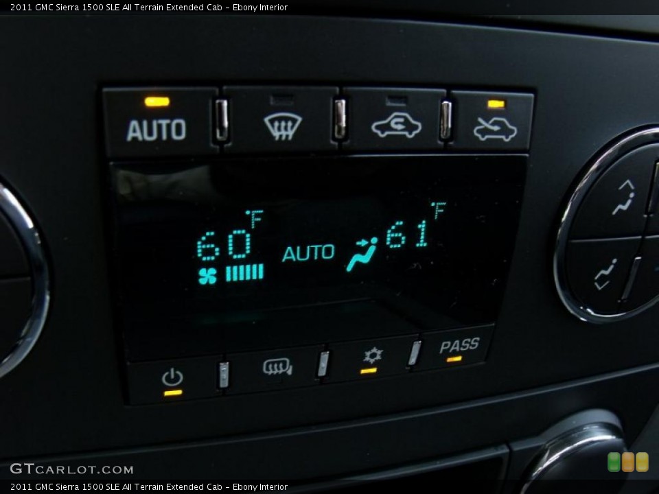 Ebony Interior Controls for the 2011 GMC Sierra 1500 SLE All Terrain Extended Cab #49866866