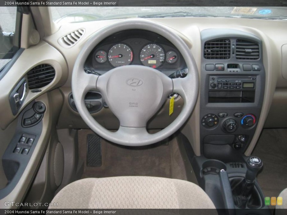 Beige Interior Dashboard for the 2004 Hyundai Santa Fe  #49873820