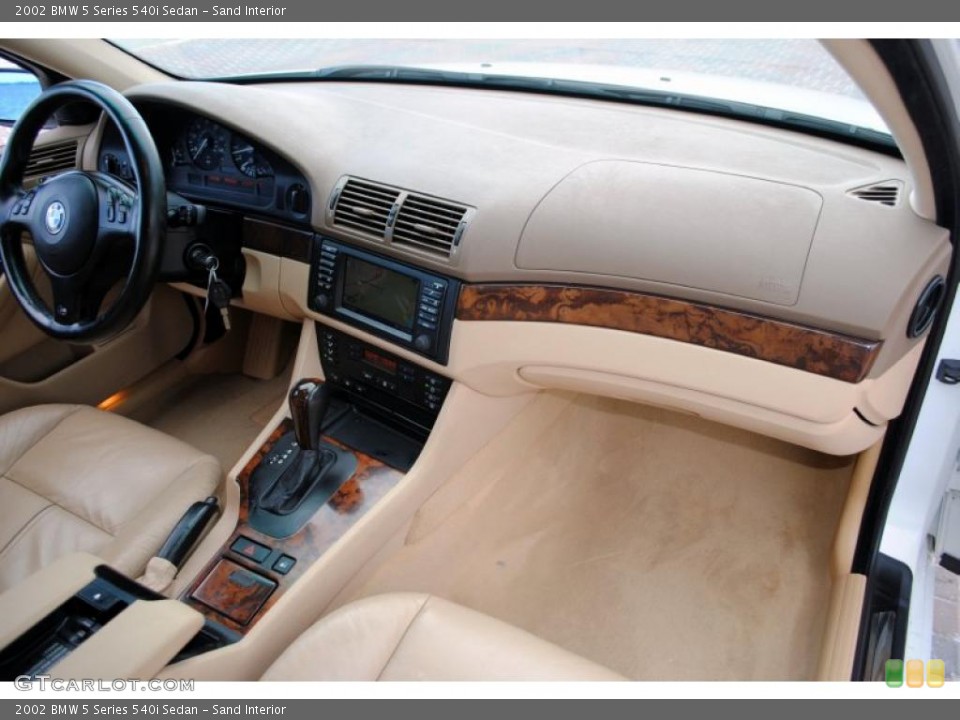 Sand Interior Dashboard for the 2002 BMW 5 Series 540i Sedan #49877408