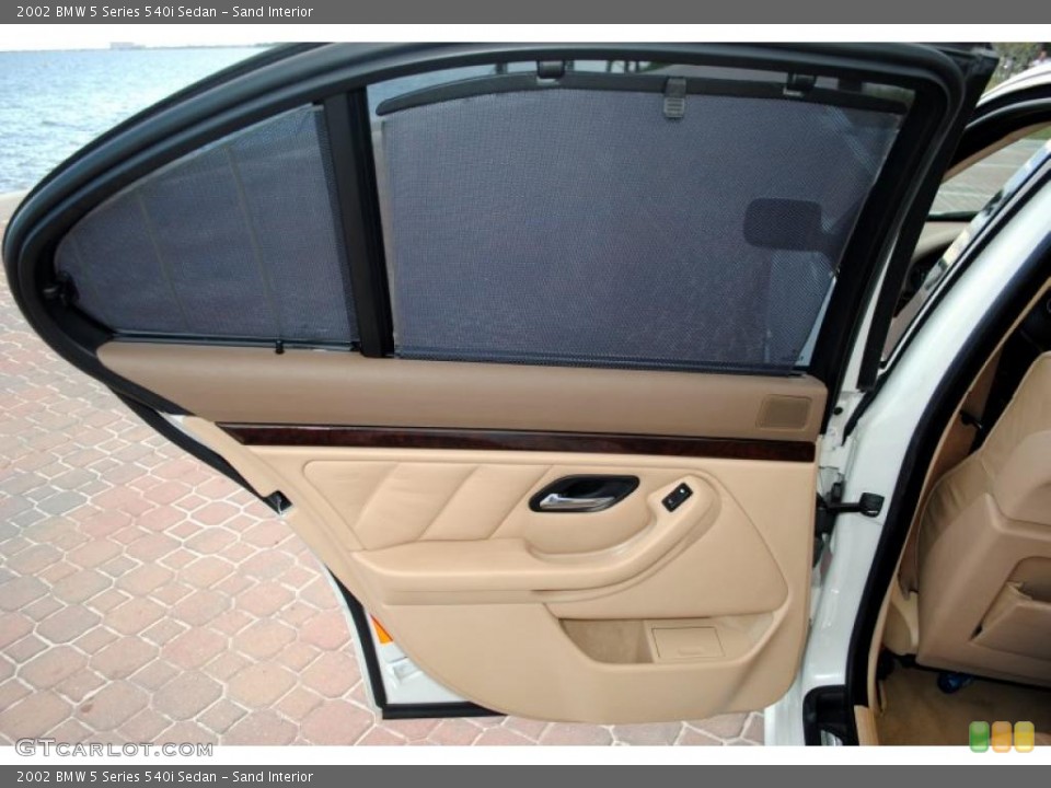 Sand Interior Door Panel for the 2002 BMW 5 Series 540i Sedan #49877507