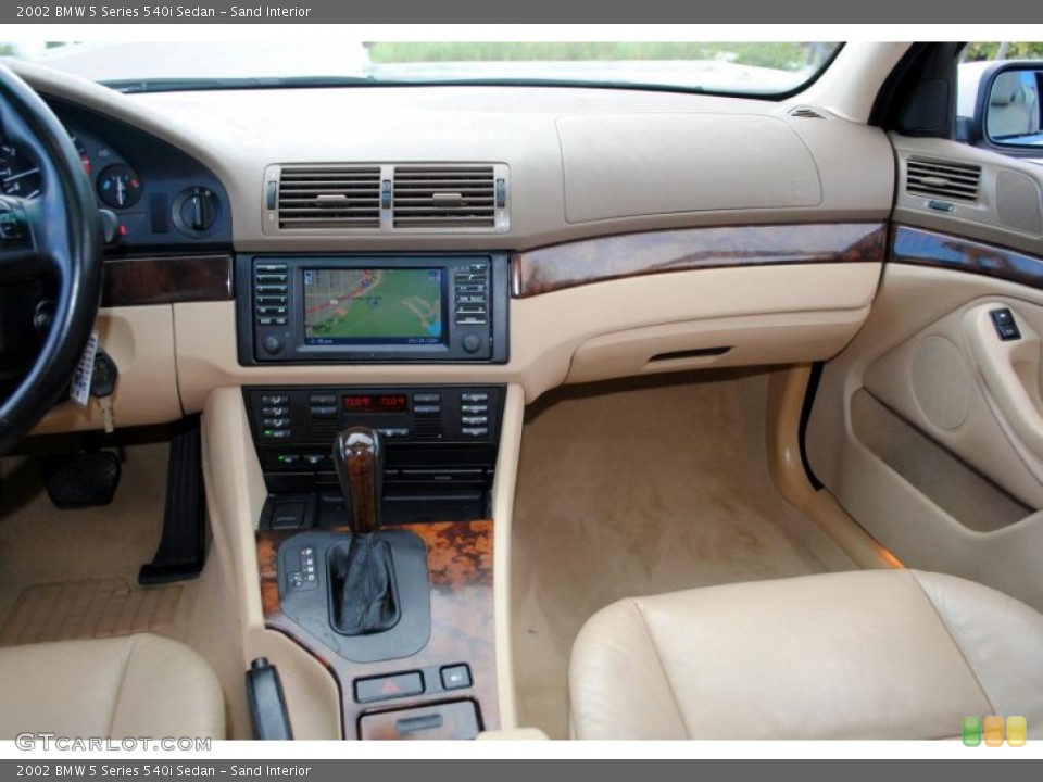 Sand Interior Dashboard for the 2002 BMW 5 Series 540i Sedan #49877639